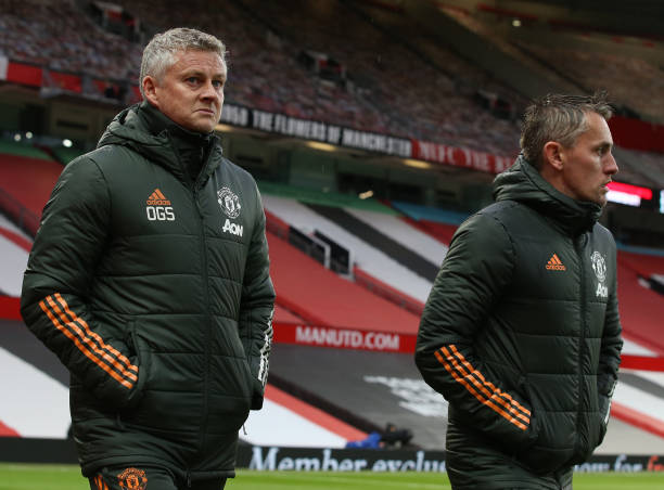 MANCHESTER, ENGLAND - MAY 11: Manager Ole Gunnar Solskjaer and Coach Kieran McKenna of Manchester United walk out for the second half during the Premier League match between Manchester United and Leicester City at Old Trafford on May 11, 2021 in Manchester, England. Sporting stadiums around the UK remain under strict restrictions due to the Coronavirus Pandemic as Government social distancing laws prohibit fans inside venues resulting in games being played behind closed doors. (Photo by Matthew Peters/Manchester United via Getty Images)