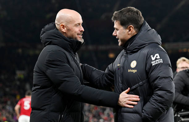 MANCHESTER, ENGLAND - DECEMBER 06: Erik ten Hag, Manager of Manchester United, and Mauricio Pochettino, Manager of Chelsea, interact prior to the Premier League match between Manchester United and Chelsea FC at Old Trafford on December 06, 2023 in Manchester, England. (Photo by Darren Walsh/Chelsea FC via Getty Images)