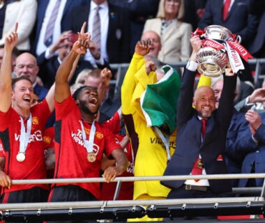 LONDON, ENGLAND - MAY 25: Erik ten Hag the head coach / manager of Manchester United lifts the FA Cup trophy during the Emirates FA Cup Final match between Manchester City and Manchester United at Wembley Stadium on May 25, 2024 in London, England.(Photo by Robbie Jay Barratt - AMA/Getty Images)